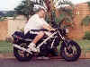 This is me and my bike about a month after aquiring it ,it has the hollow silencer sounds awesome.
